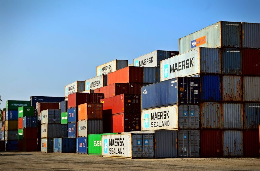 Cargo containers at shipping port - invoice factoring for trucking companies in Virginia
